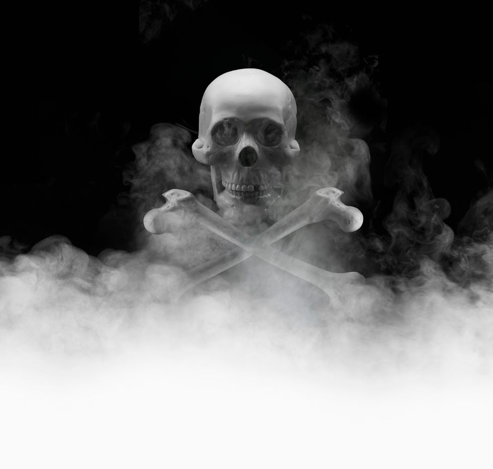 Skull and crossbones in smoke
