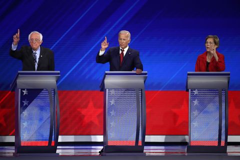 houston, texas   september 12 democratic presidential candidates sen bernie sanders i vt, former vice president joe biden, and sen elizabeth warren d ma raise their hands during the democratic presidential debate at texas southern university's health and pe center on september 12, 2019 in houston, texas ten democratic presidential hopefuls were chosen from the larger field of candidates to participate in the debate hosted by abc news in partnership with univision photo by win mcnameegetty images