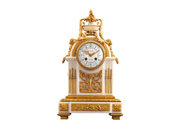 Orologio vintage in stile Luigi XVI. Il resto nel testo.