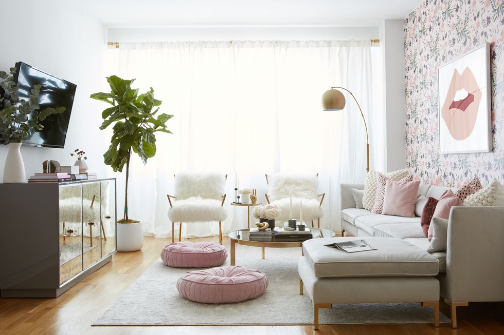 Living room, Room, Furniture, Interior design, Property, Pink, Table, Coffee table, Building, Floor, 