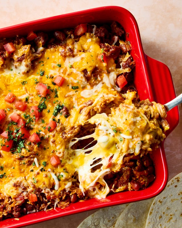 seared chorizo sausage, hearty pinto beans, salsa, and rice are baked until the rice is tender then topped with a mountain of cheese and broiled to melty perfection