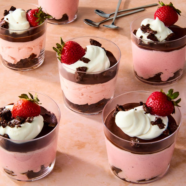 Chocolate-covered strawberry mousse chocolatecovered strawberry mousse cups topped with whipped cream, chocolate oreo crunchies, and a fresh strawberry