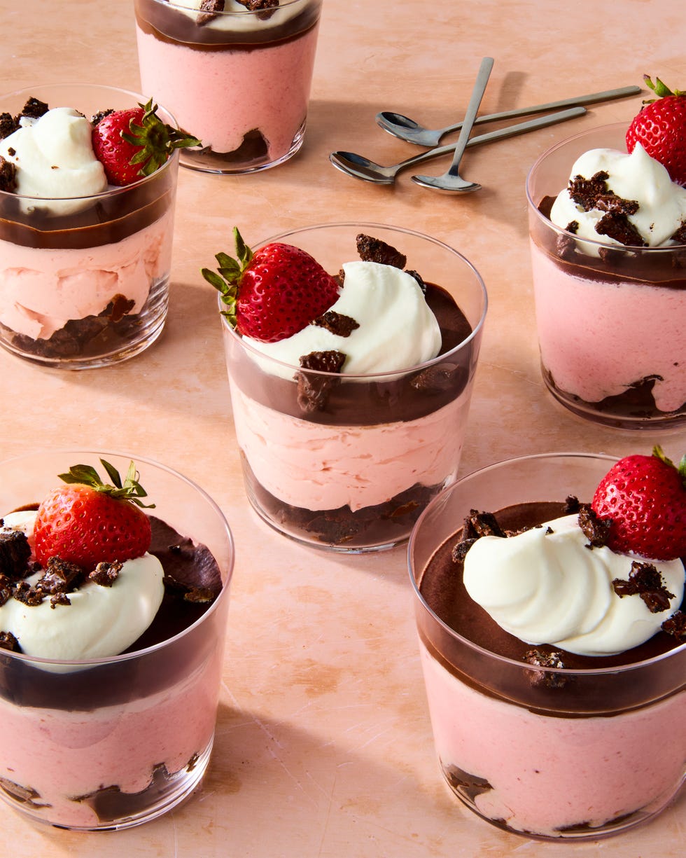 chocolate covered strawberry mousse topped with chocolate ganache, whipped cream, chocolate oreo crunchies, and a strawberry