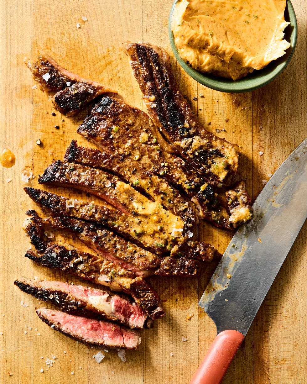 juicy ribeye steak basted and served with zesty spicy butter