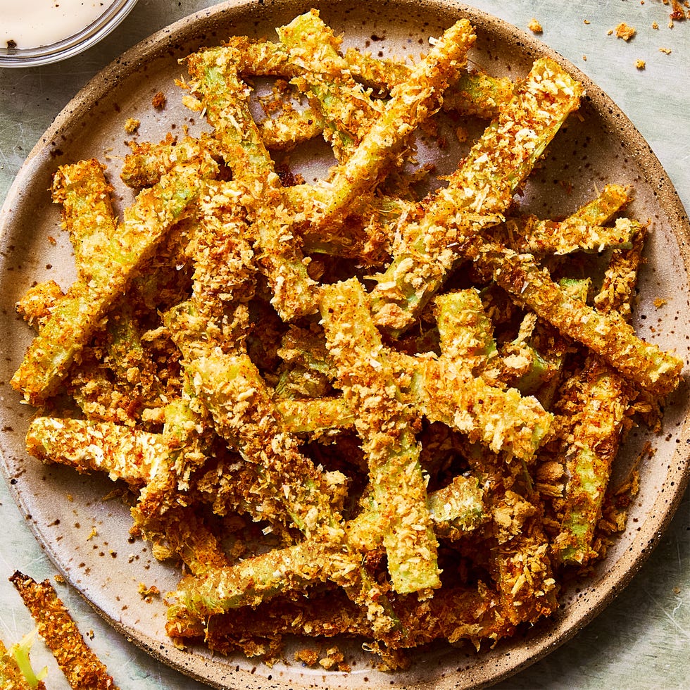 crispy parmesan broccoli stem fries on a plate