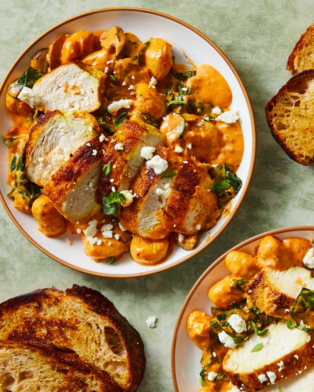 pillowy gnocchi in a creamy harissa sauce with ras al hanout spiced chicken, sliced mushrooms, spinach, and crumbled feta