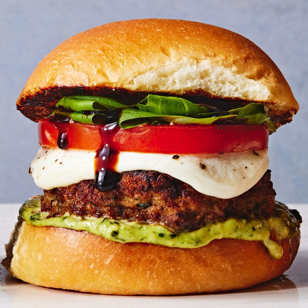 caprese turkey burger topped with mozzarella, tomato, basil, and balsamic drizzle