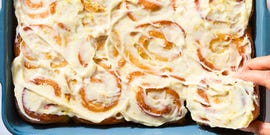 pillowy soft rolls stuffed with a lemon curd filling studded with ground cardamom and freshly grated ginger, and topped with fluffy cream cheese frosting