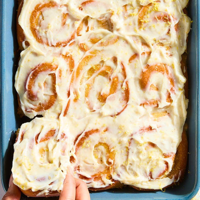 pillowy soft rolls stuffed with a lemon curd filling studded with ground cardamom and freshly grated ginger, and topped with fluffy cream cheese frosting