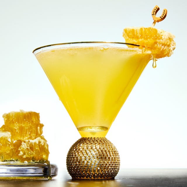 Beyhive Bellini a blend of honey, tequila, peach nectar, and lemon juice makes this cocktail the perfect balance of sweet and tangy, while the prosecco keeps it light