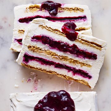 slices of blueberry cheesecake icebox cake on a marble platter