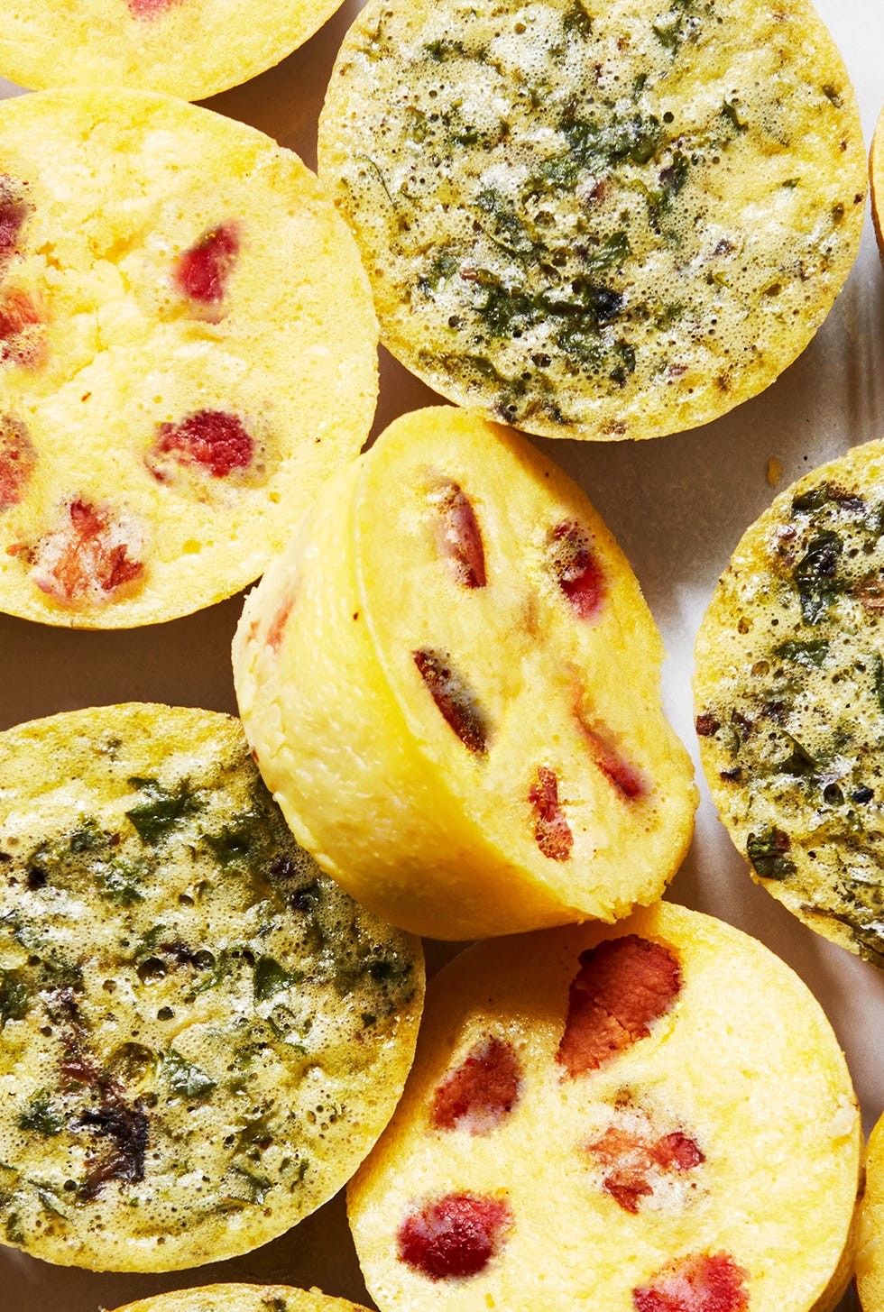 Copycat Starbucks Egg Bites whipped eggs and cottage cheese blended with crispy bacon or sauteed kale and mushroom and steamed in the oven until fluffy