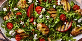 grilled plums tossed with crispy pancetta, tangy goat cheese﻿, fresh cherry tomatoes, and grilled sourdough bread, then drizzled with a maple dijon dressing