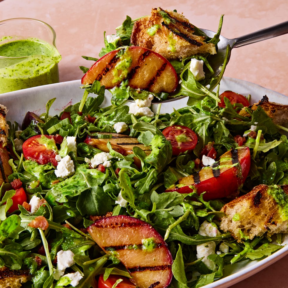 grilled plums tossed with crispy pancetta, tangy goat cheese﻿, fresh cherry tomatoes, and grilled sourdough bread, then drizzled with a maple dijon dressing