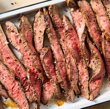 brown sugar and dijon marinated flank steak, broiled to medium rare, thinly sliced, and served with roasted garlic and herb butter