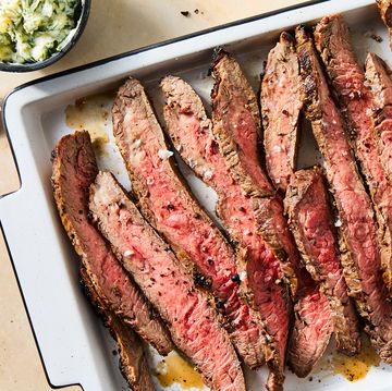 brown sugar and dijon marinated flank steak, broiled to medium rare, thinly sliced, and served with roasted garlic and herb butter