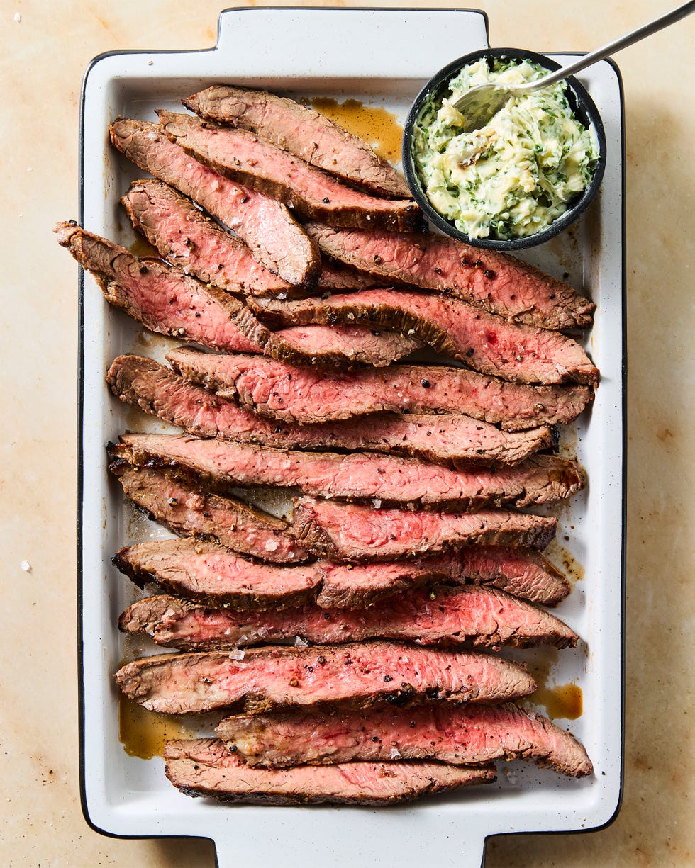 brown sugar and dijon marinated flank steak, broiled to medium rare, thinly sliced, and served with roasted garlic and herb butter
