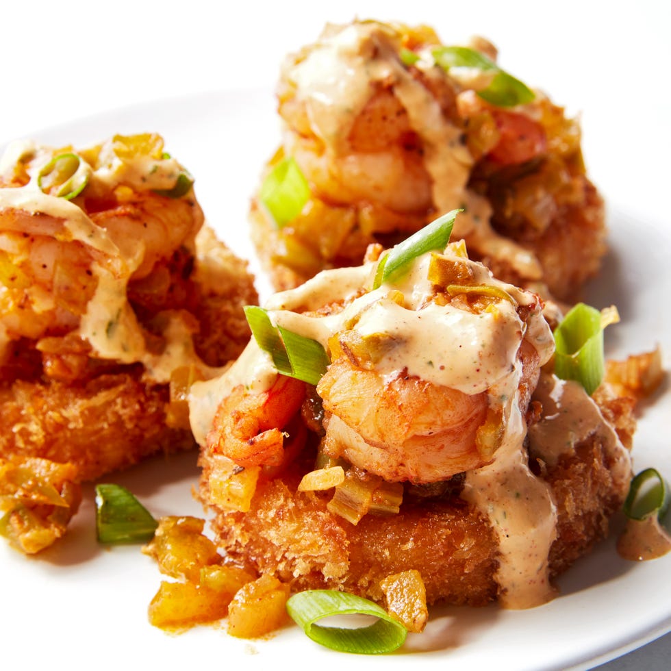 smoked gouda grits, breaded and fried until crispy then topped with cajun seasoned shrimp and creamy remoulade sauce