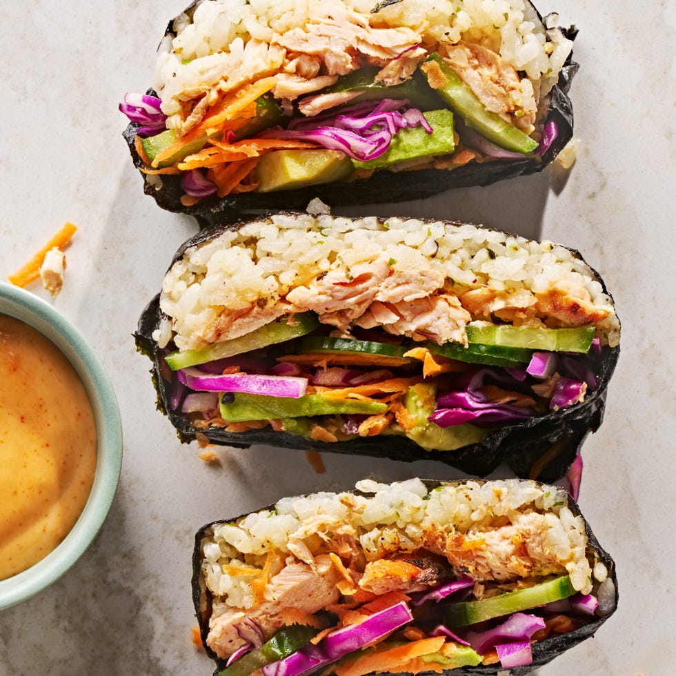 spicy salmon, seasoned sushi rice, cucumber, pickled cabbage, carrot, and avocado, all wrapped in nori and served with sriracha soy mayo