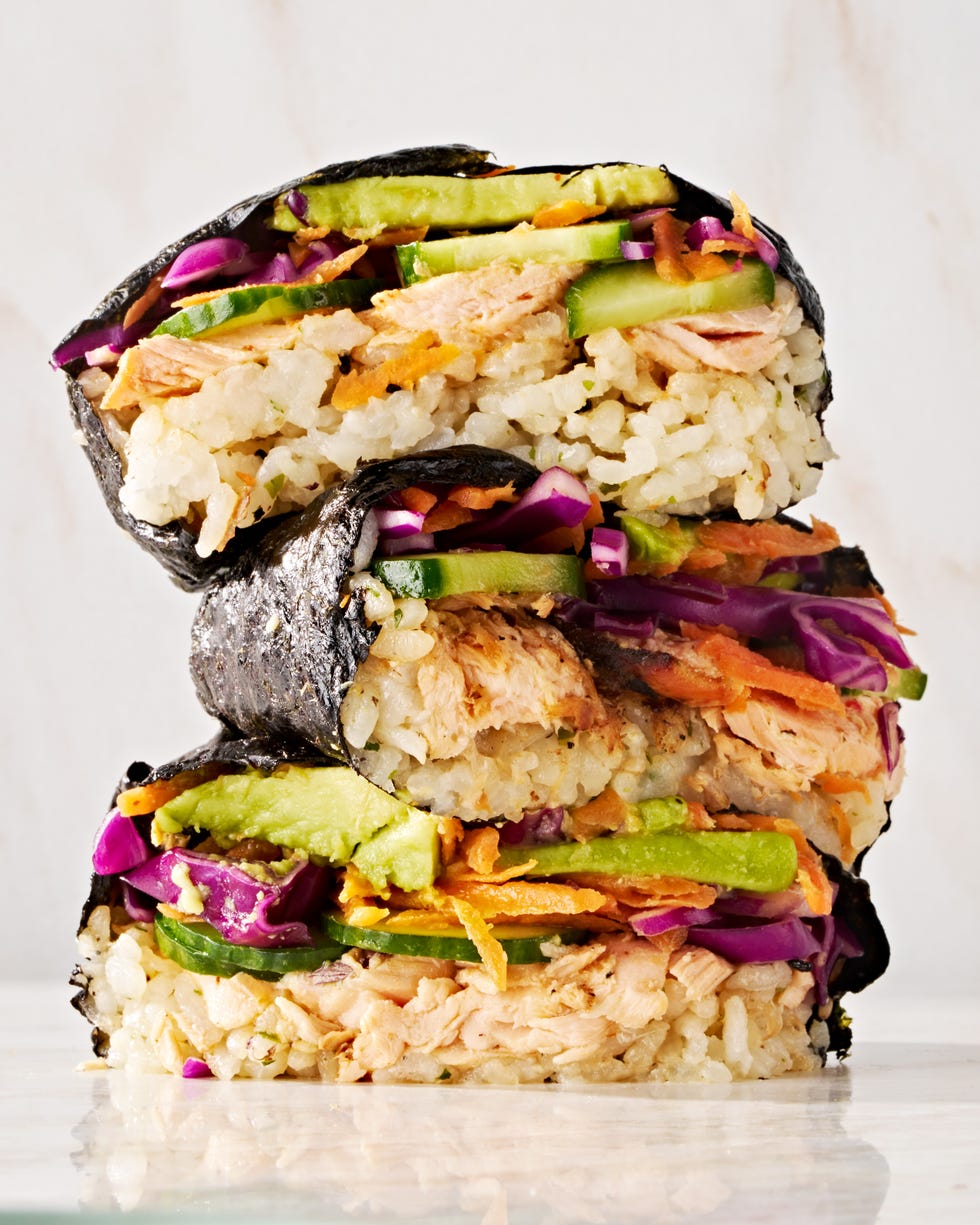 spicy salmon, seasoned sushi rice, cucumber, pickled cabbage, carrot, and avocado all wrapped in nori and served with sriracha soy mayo