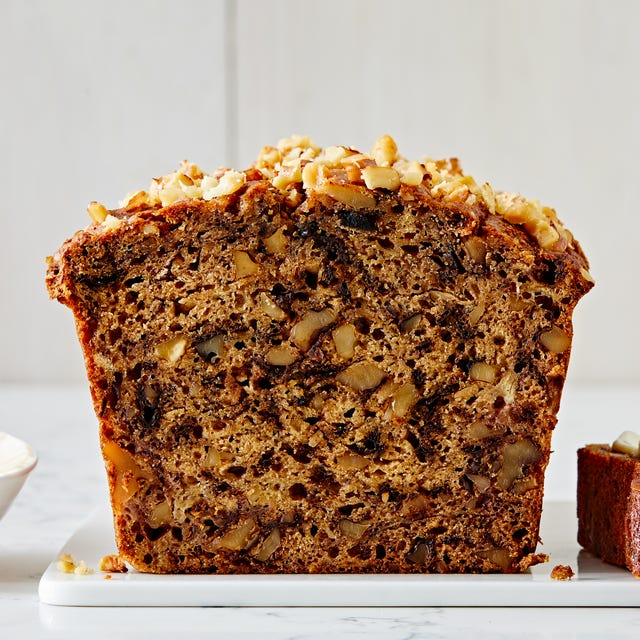 banana nut bread on a white platter
