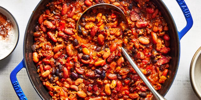 hearty, creamy beans are cooked with bacon, ground beef, aromatics, and pickled jalapenos in a sweet, slightly spicy, and tangy sauce