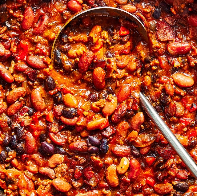 Cowboy Beans hearty, creamy beans are cooked with bacon, ground beef, aromatics, and pickled jalapenos in a sweet, slightly spicy, and tangy sauce