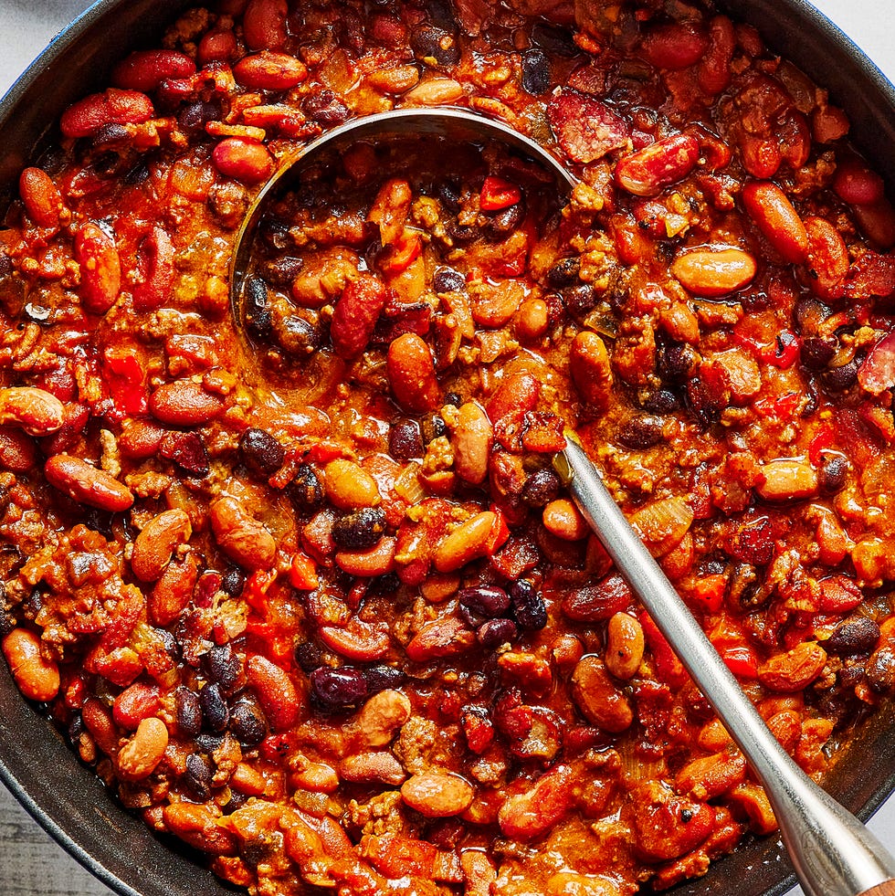 hearty, creamy beans are cooked with bacon, ground beef, aromatics, and pickled jalapenos in a sweet, slightly spicy, and tangy sauce