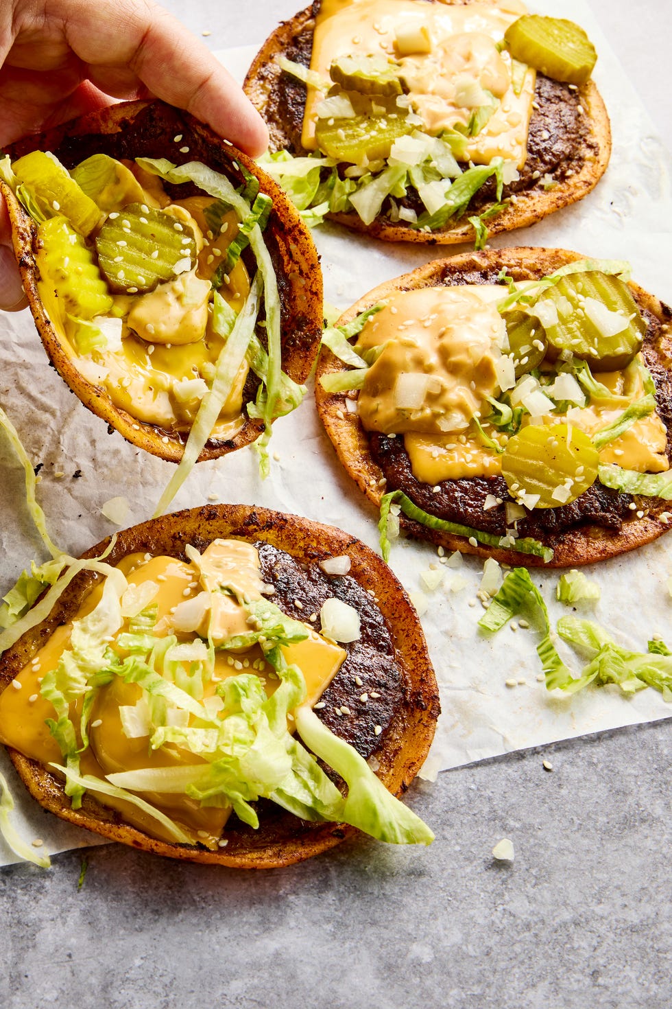 Smashburger Tacos The ultimate comfort food hybrid: a crispy, juicy thin beef patty, melted American cheese, and all the classic burger fixings stuffed into a toasted flour tortilla.