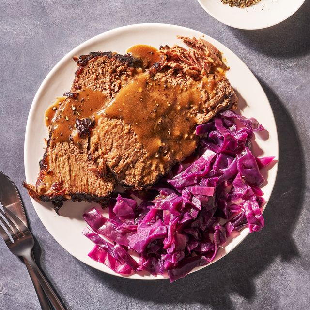 sauerbraten on a plate with red cabbage