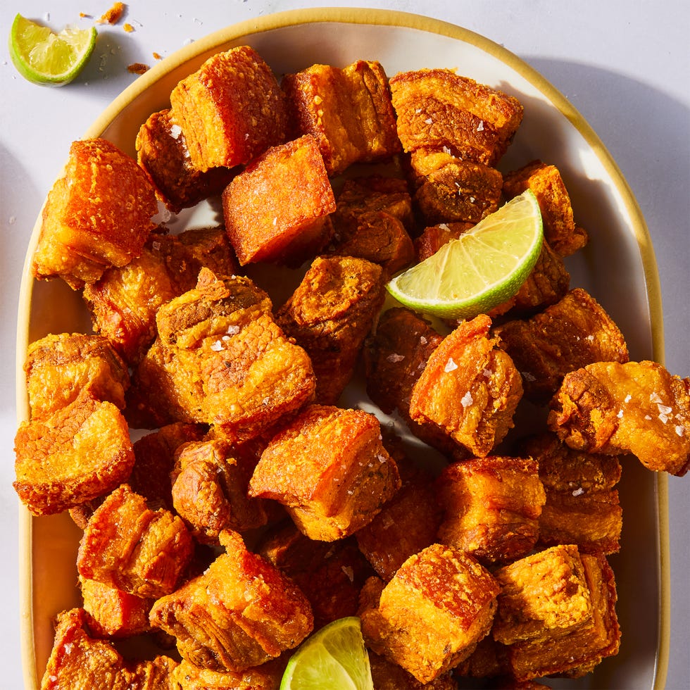 garlic, sour orange, and oregano marinated cubes of pork belly are boiled until tender then fried until deep golden brown, crunchy, and insanely juicy