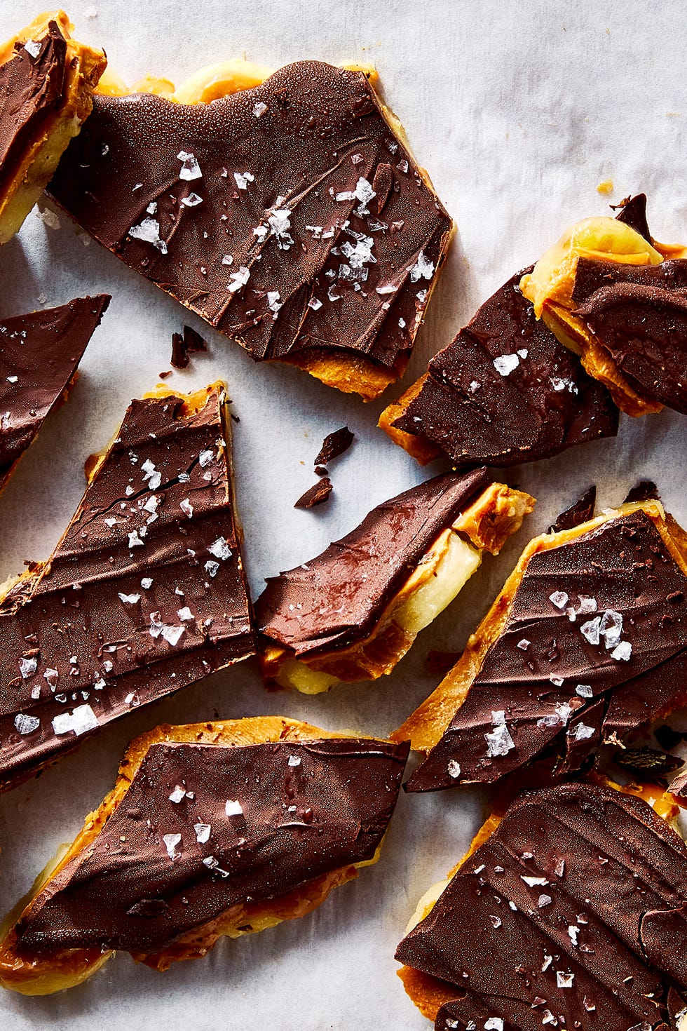 Chocolate Peanut Butter Banana Bark a layer of bananas gets covered in smooth, unsweetened peanut butter, then drizzled with melted chocolate and frozen until stiff enough to snap into single servings