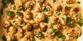 ground chicken and pork with garlic, fresh thyme, and grated parmesan cheese, seared in sundried tomato oil, then tossed in a garlicky, sundried tomato studded cream sauce and topped with torn fresh basil