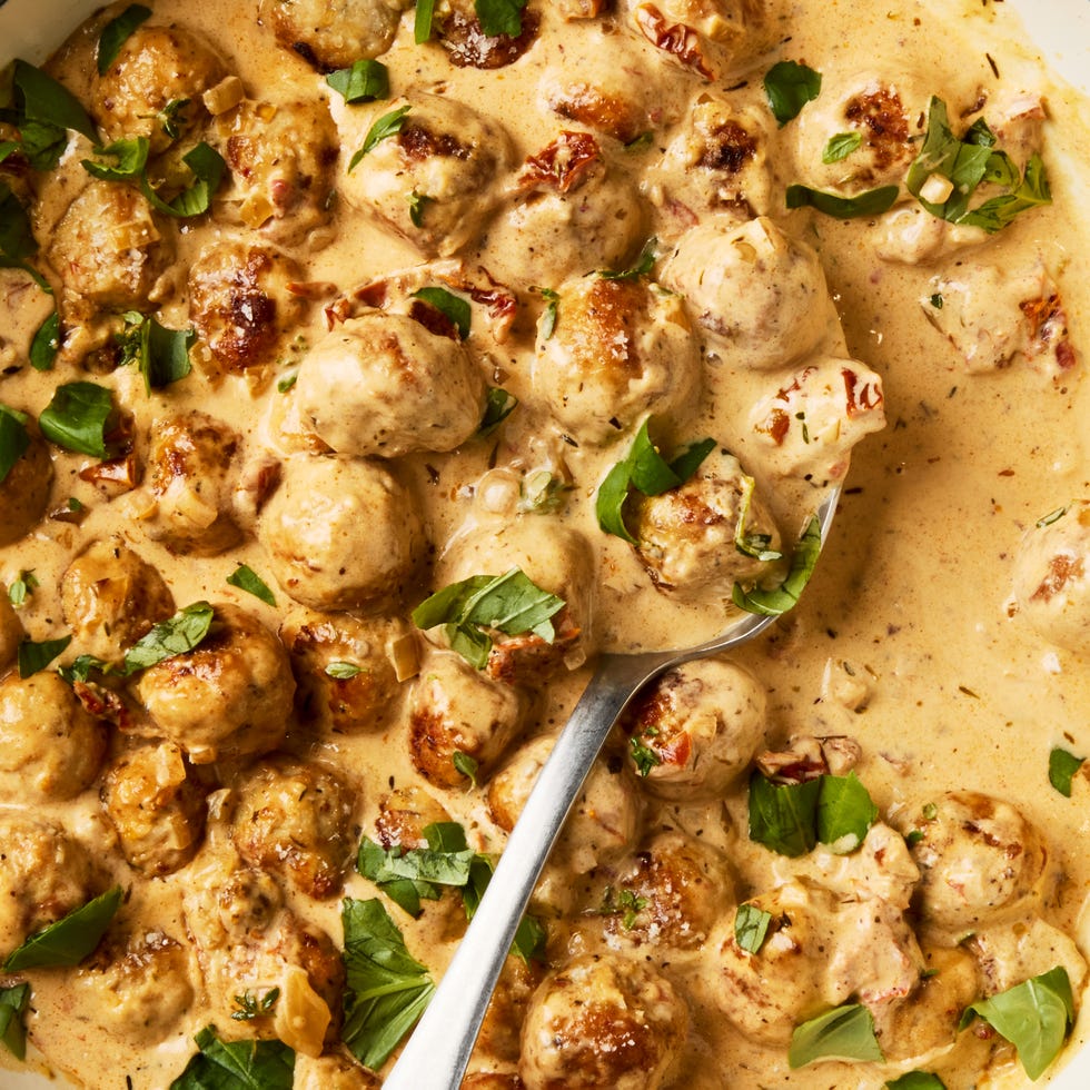 ground chicken and pork with garlic, fresh thyme, and grated parmesan cheese, seared in sundried tomato oil, then tossed in a garlicky, sundried tomato studded cream sauce and topped with torn fresh basil