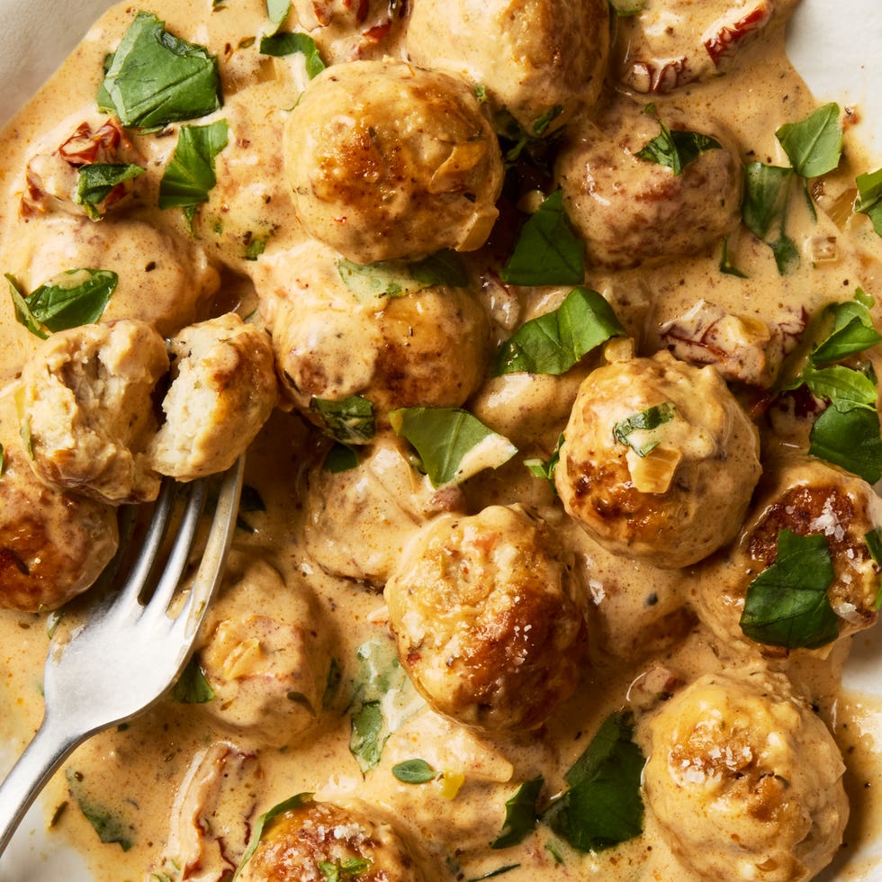 ground chicken and pork with garlic, fresh thyme, and grated parmesan cheese, seared in sundried tomato oil, then tossed in a garlicky, sundried tomato studded cream sauce and topped with torn fresh basil