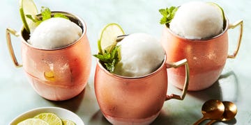 moscow mule sorbet served in copper mugs garnished with a lime wheel and mint sprig