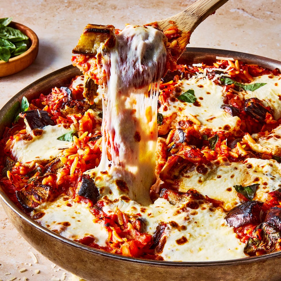 orzo is simmered in a thyme and garlic tomato sauce and then tossed with pan fried eggplant, topped with fresh mozzarella, and broiled until bubbly
