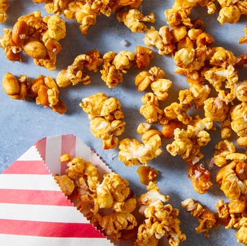 Salted Honey Peanut Caramel Corn caramel sauce, honey, and roasted peanuts get tossed with popcorn and baked until crisp and crunchy