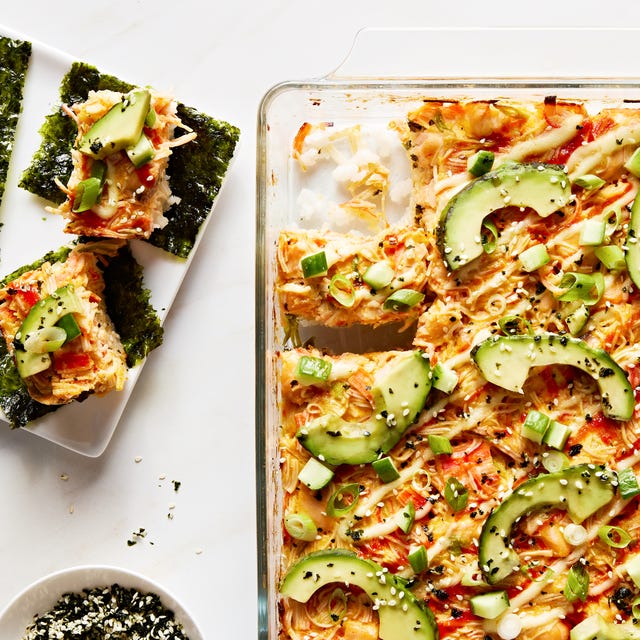 seasoned sushi rice and spicy chopped crab baked and topped with sriracha, kewpie mayo, avocado, cucumber, and furikake