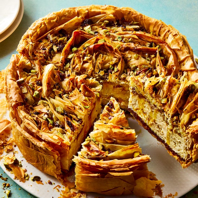 Baklava Cheesecake pistachio orange cheesecake with walnut and pistachio baklava crust and honey syrup