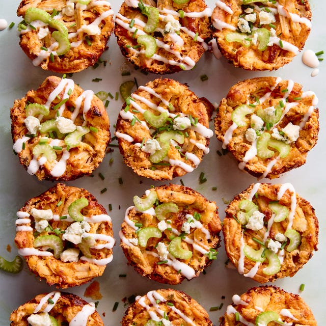 classic buffalo chicken dip with chopped chicken, cream cheese, cheddar, blue cheese, hot sauce, and chives baked into a crisp puff pastry shell until bubbling and golden