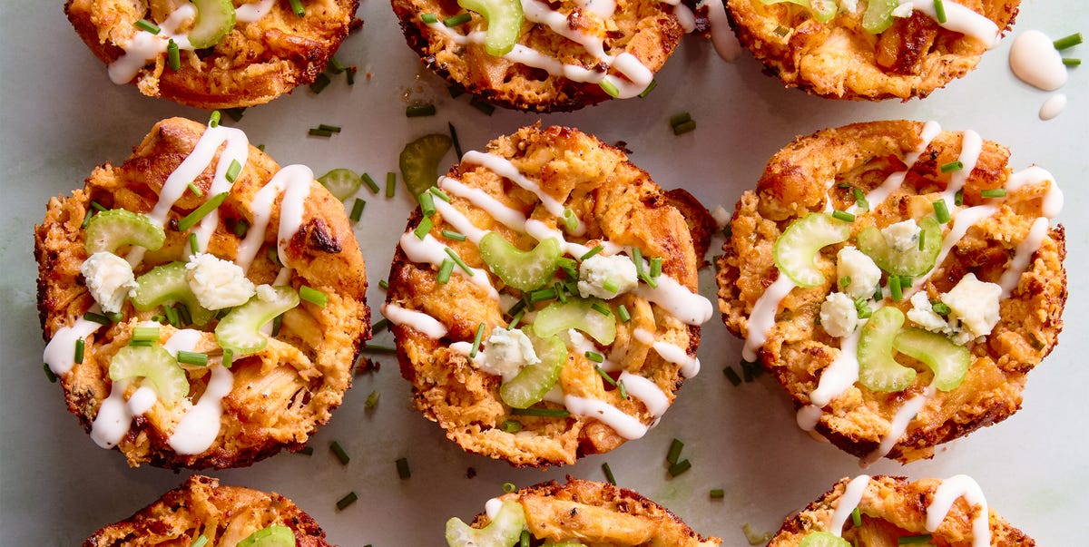Buffalo Blitz Bites classic buffalo chicken dip with chopped chicken, cream cheese, cheddar, blue cheese, hot sauce, and chives baked into a crisp puff pastry shell until bubbling and golden