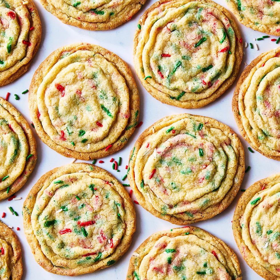 pan banging holiday confetti cookies on a white table