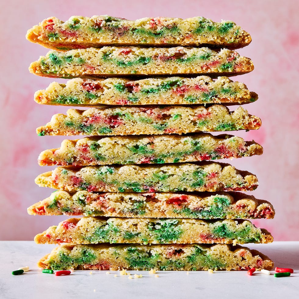 panbanging holiday confetti cookies in a stack