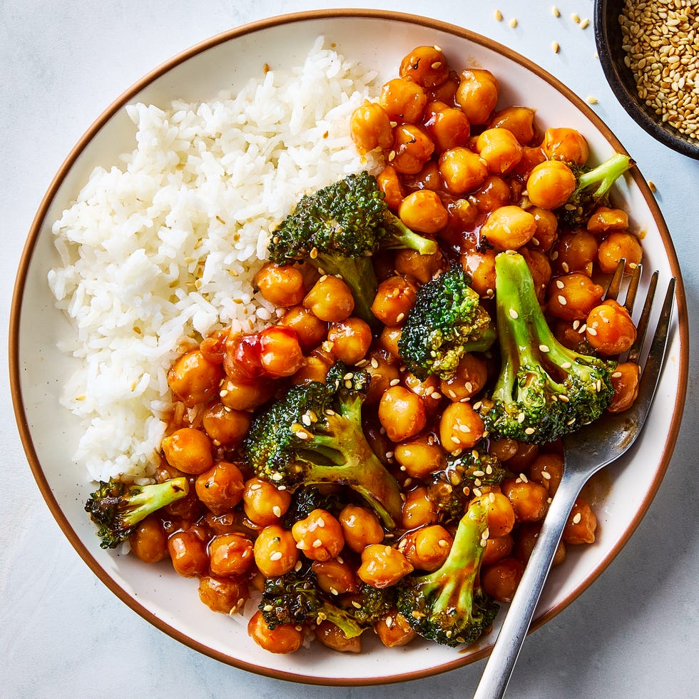 sticky sesame chickpeas and broccoli on a plate with rice