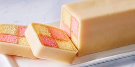 battenberg cake sliced on a white platter
