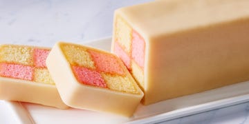 battenberg cake sliced on a white platter