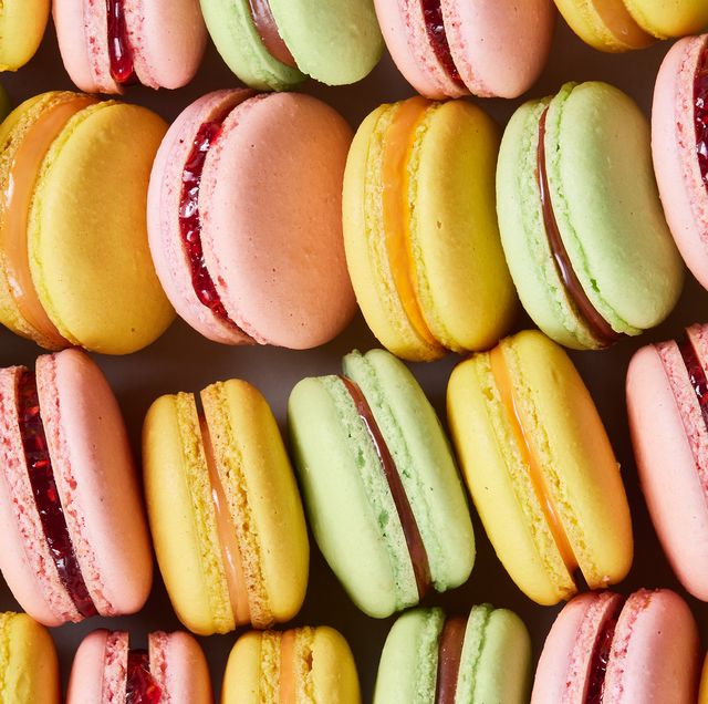pink, green, and yellow macarons lined up together