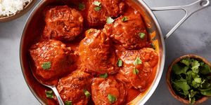 garam masala seasoned and seared chicken thighs smothered in spicy, creamy red curry sauce