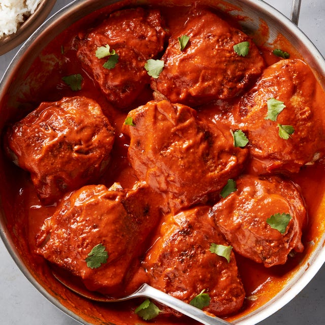 Red Curry Chicken Thighs & Rice garam masala seasoned and seared chicken thighs smothered in spicy, creamy red curry sauce